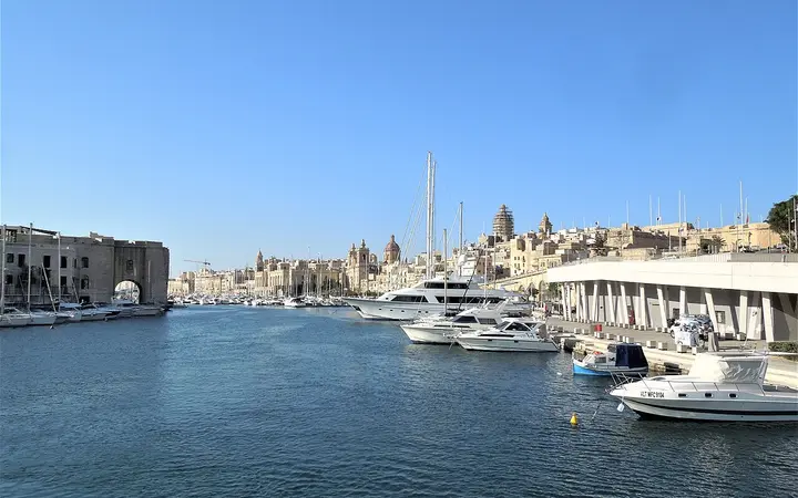 Yachts in the Birgu marina with the waterfront buildings of Birgu behind