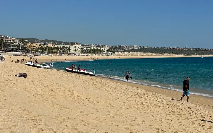Wide sandy Médano Beach curving along Cabo San Lucas Bay
