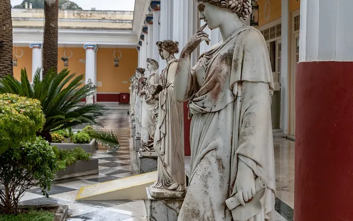 Statues along the colonnaded peristyle of the Achilleion