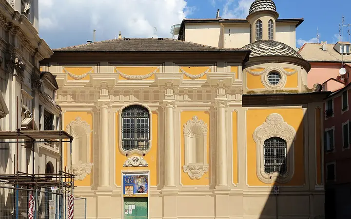 Yellow façade of the Cappella Sistina in Savona