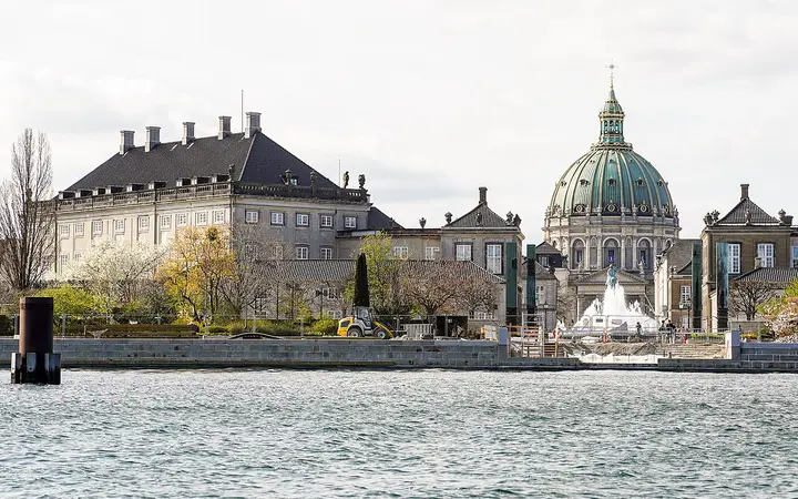 Amalienborg's Schack's Palace and the domed Marble Church seen across the harbour from the water