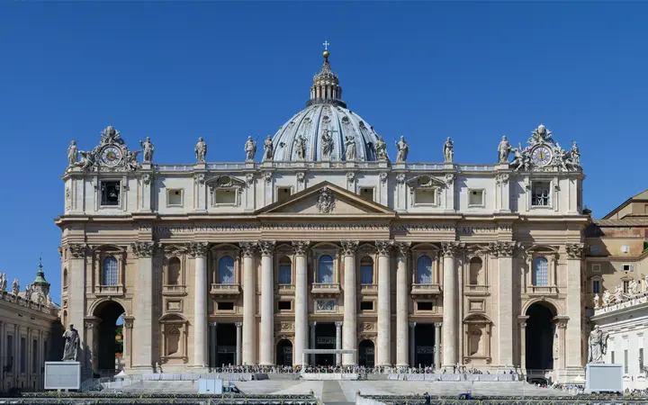 Main facade of St. Peter's Basilica in the Vatican with Michelangelo's dome behind it
