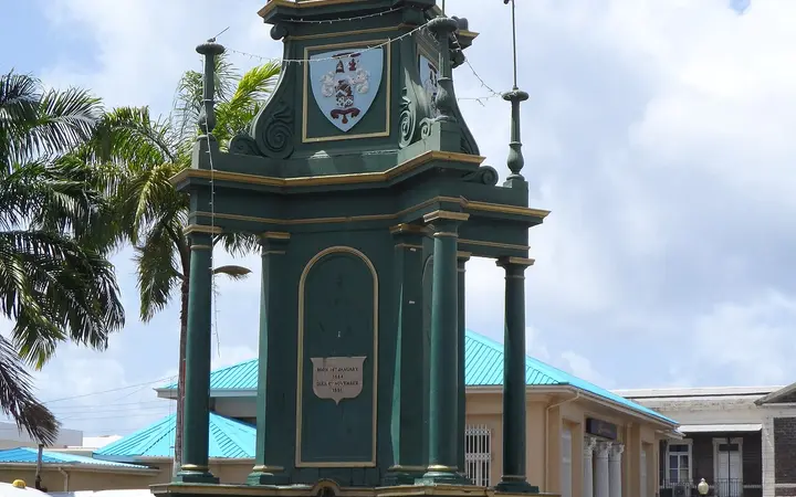 The green Berkeley Memorial clock tower at The Circus in Basseterre