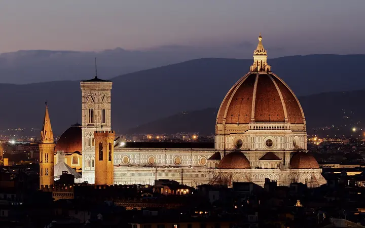 Florence Cathedral dome and Giotto's bell tower at dusk seen from Piazzale Michelangelo