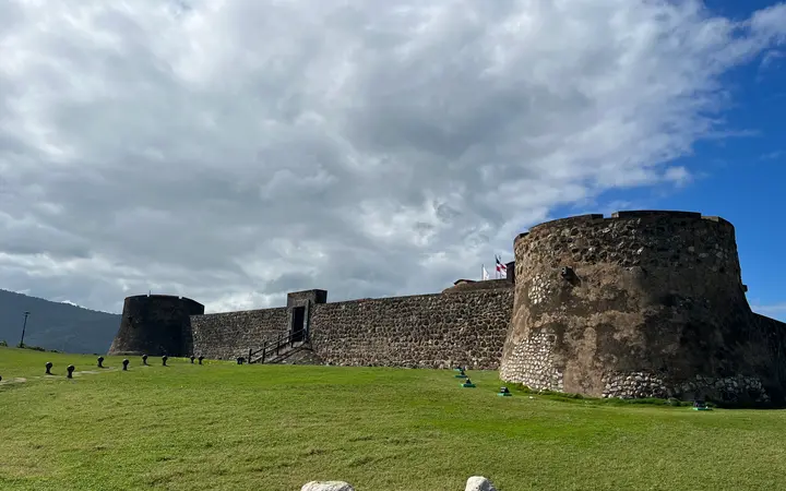 Stone walls and round tower of Fortaleza de San Felipe in Puerto Plata