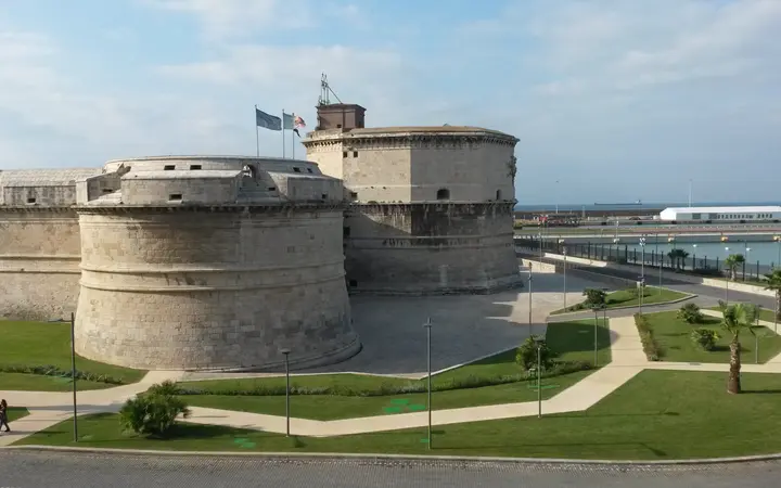 The round towers and walls of Forte Michelangelo beside the historic port of Civitavecchia