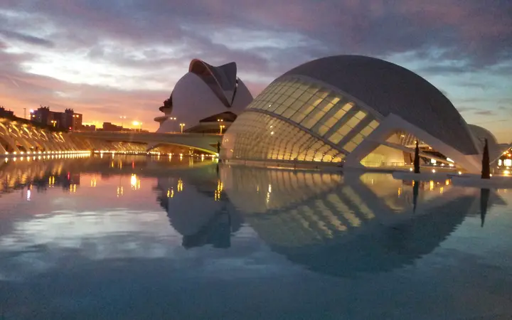 The Hemisfèric and Palau de les Arts reflected in water at the City of Arts and Sciences