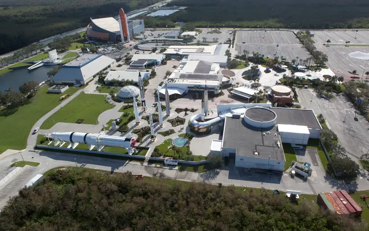 Aerial view of Kennedy Space Center Visitor Complex with the Rocket Garden and the Space Shuttle Atlantis building