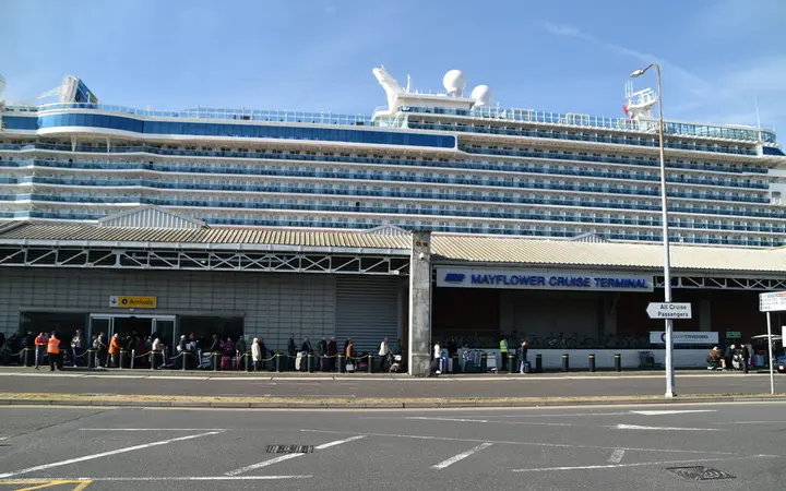 Mayflower Cruise Terminal with a cruise ship alongside