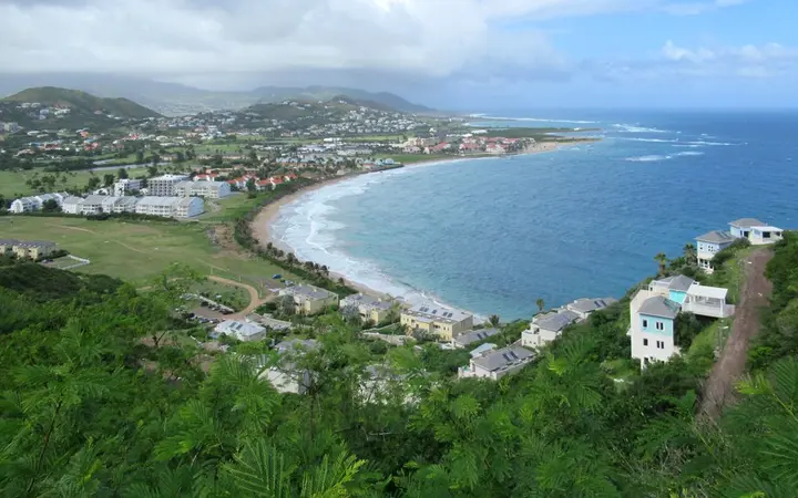 View over Frigate Bay on St Kitts with the beach curving along the Atlantic side