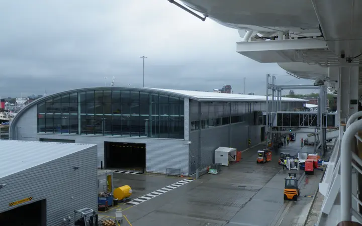 Ocean Cruise Terminal building and quayside seen from a docked ship