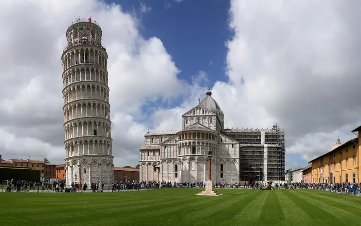Leaning Tower and Pisa Cathedral on the lawns of Piazza dei Miracoli