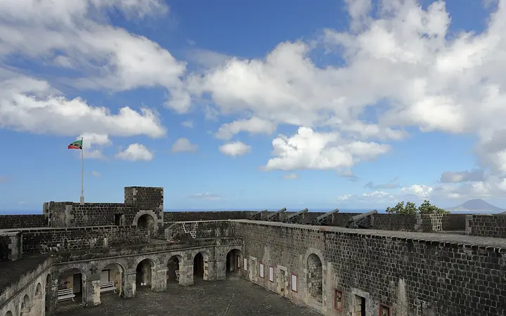 Stone walls and cannon around the parade ground of the Citadel at Brimstone Hill Fortress