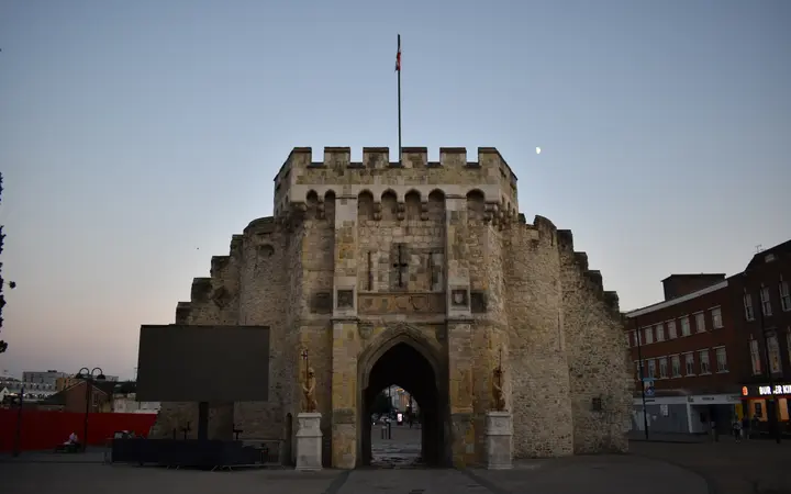 The medieval Bargate gatehouse in Southampton at dusk