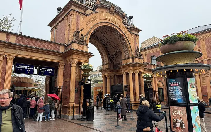 Ornate arched main entrance to Tivoli Gardens in Copenhagen