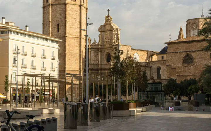 The Micalet bell tower of Valencia Cathedral above Plaça de la Reina
