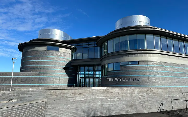 Exterior of the Wyllieum at Greenock Ocean Terminal under a blue sky